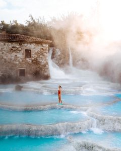 Hot springs in Saturnia drone shot with morning mist