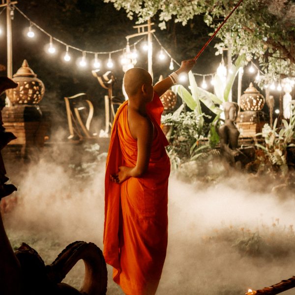 Monk setting off fireworks in Chiang Mai, Thailand