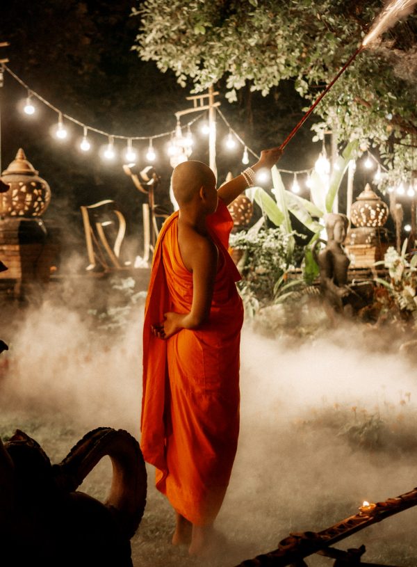 Monk setting off fireworks in Chiang Mai, Thailand