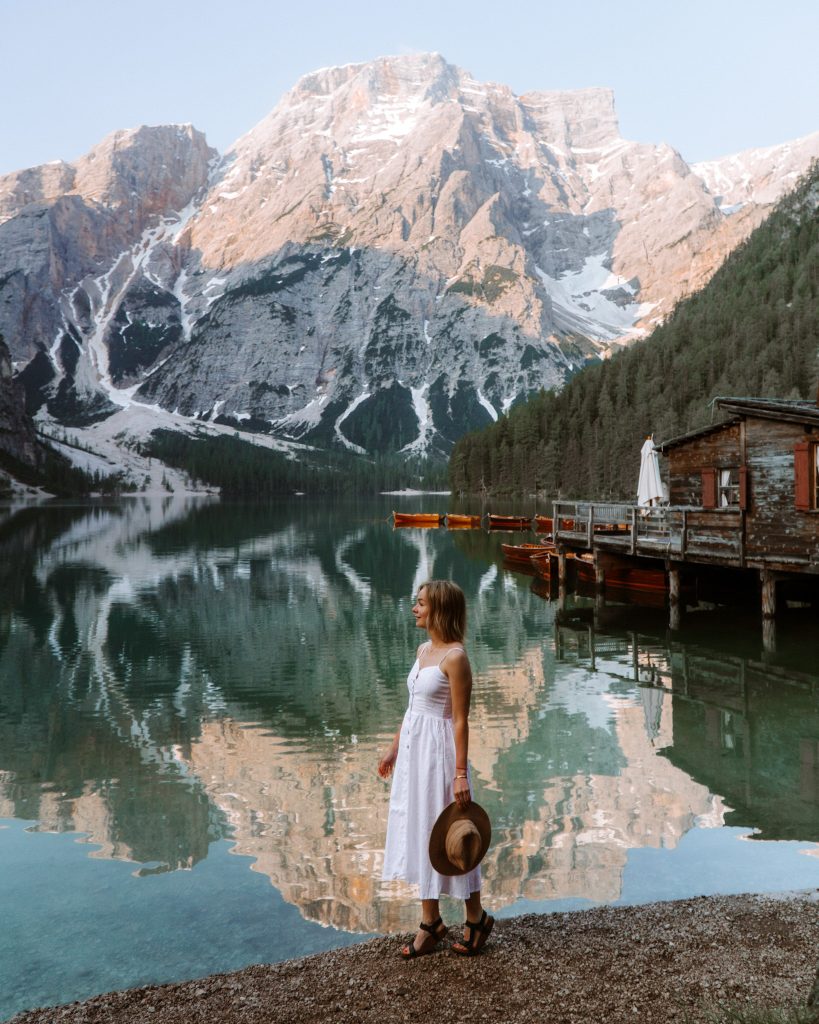 A girls in front Lago di Braies in the Dolomites