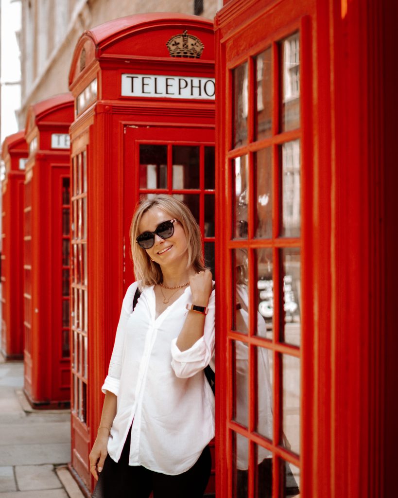 Row of red phone booths in London, England