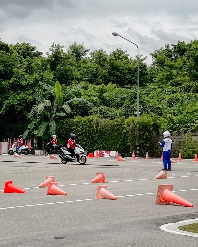 Slow plank ride for Thai motorcycle driving test
