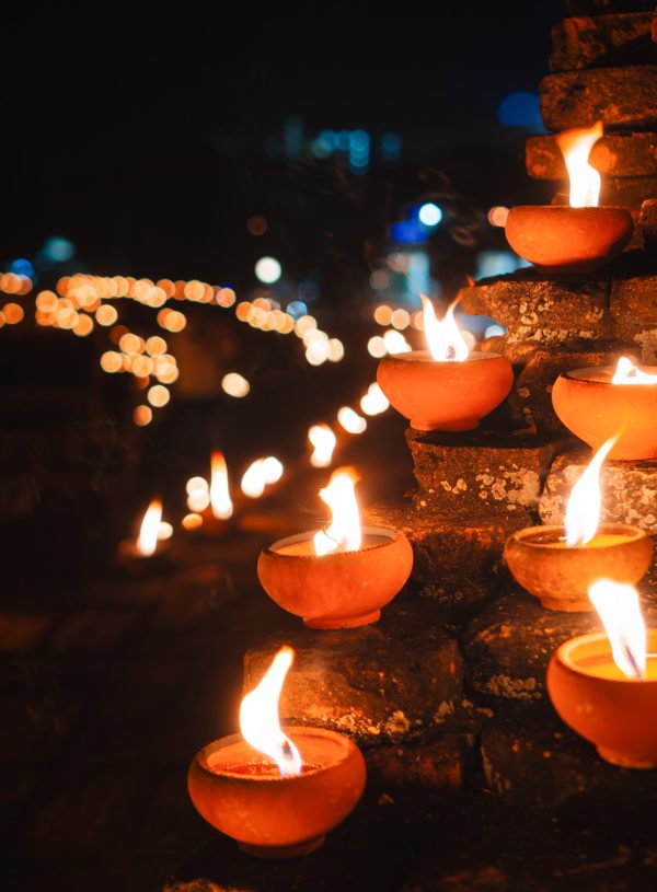Candles at city walls in Chiang Mai during Yi Peng