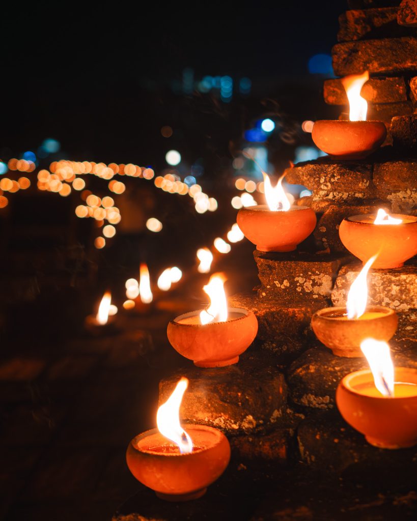 Candles at city walls in Chiang Mai during Yi Peng