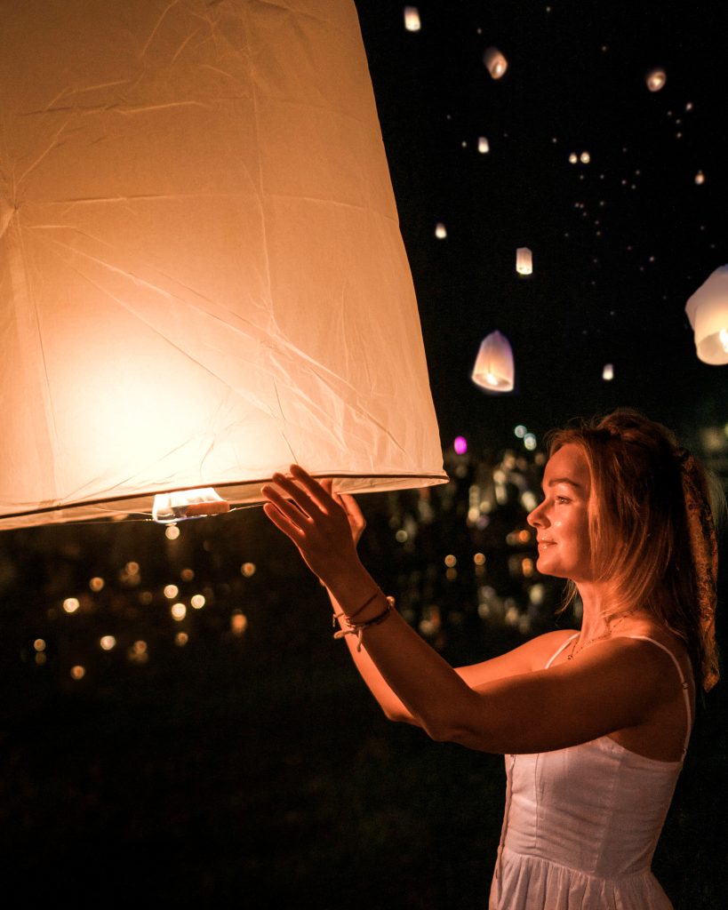 Releasing lantern during free lantern festival in Doi Saket
