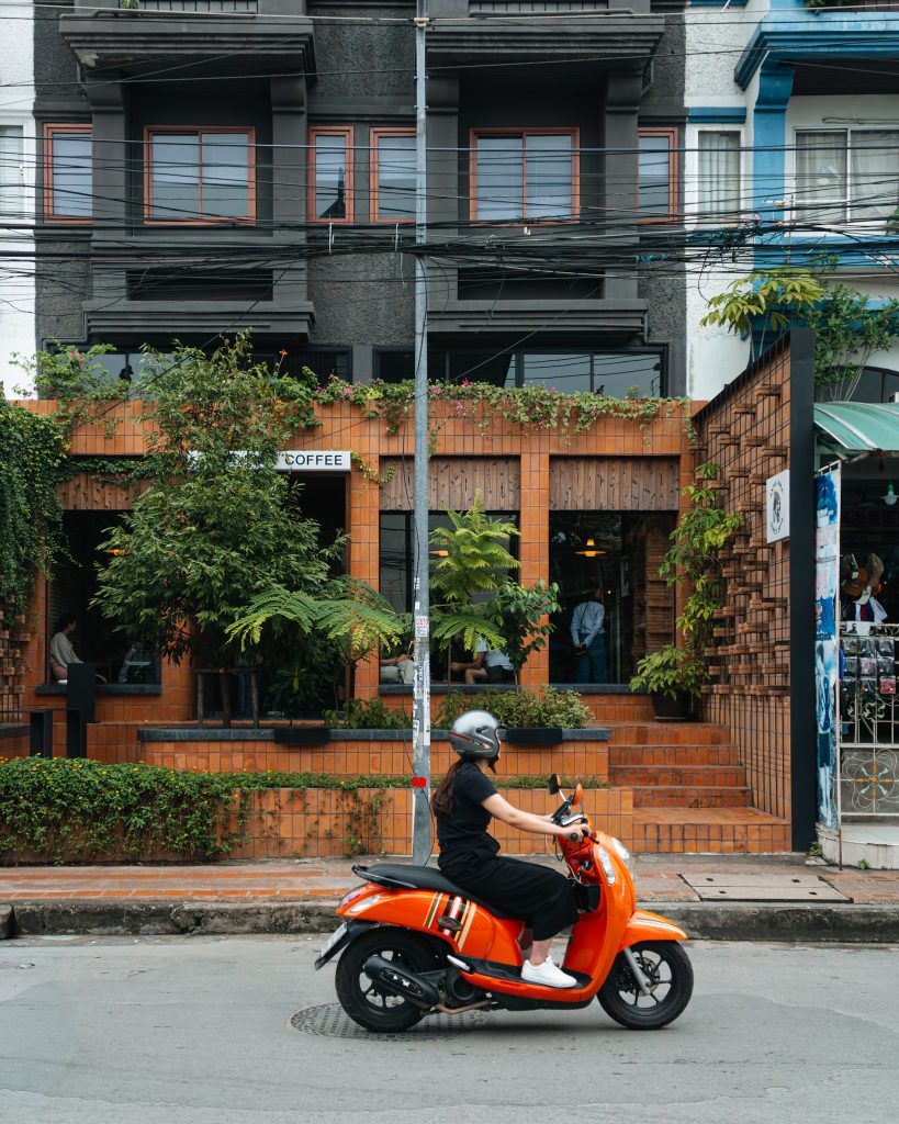 A girl scooting in Chiang Mai, Thailand