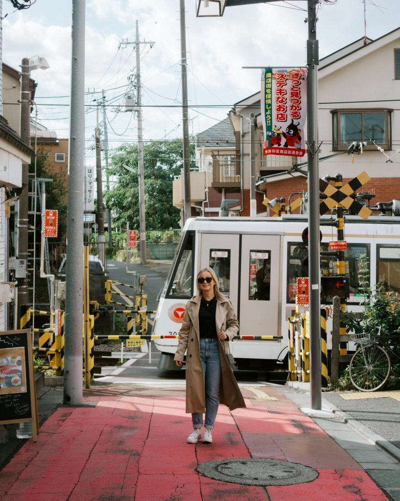 Aga in front of the train in Japan